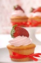Delicious Vanilla cupcake with strawberry frosting Royalty Free Stock Photo
