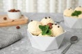 Delicious vanilla ice cream with mint, hazelnuts and chocolate chips Royalty Free Stock Photo