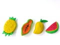 Delicious variety fruit, colorful plasticine clay, sweet pineapple banana mango watermelon dough