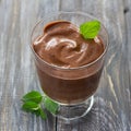 ÃÂ¡hocolate mousse with banana, cocoa and mint in glass