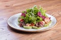 Delicious vegetable salad with tomato and olives. Royalty Free Stock Photo