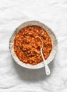 Delicious vegetarian cauliflower cabbage bolognese sauce on light background, top view. Healthy diet food concept