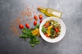 Delicious vegetarian lentil salad with lemon, mint and cherry tomato