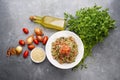 Delicious vegetarian quinoa salad with parsley, tomato and onion Royalty Free Stock Photo