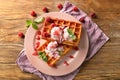 Delicious waffles with berry jam and ice cream on plate Royalty Free Stock Photo