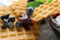 Delicious waffles with blueberry jam, closeup Royalty Free Stock Photo