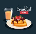 Delicious waffles with strawberries and orange juice