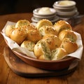 Delicious warm garlic rolls in a basket.