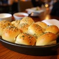 Delicious warm garlic rolls in a basket.