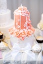 Delicious wedding cake decorated with sugar flowers Royalty Free Stock Photo