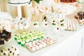 Delicious wedding reception candy bar dessert table Royalty Free Stock Photo