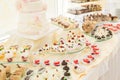 Delicious wedding reception candy bar dessert table Royalty Free Stock Photo