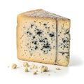 Delicious wedge of blue cheese with crumbling texture and scattered chunks on a light surface Royalty Free Stock Photo
