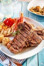 Delicious well done surf and turf steak and lobster meal Royalty Free Stock Photo