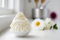 Delicious whipped cream dessert on minimalist kitchen table