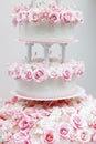 Delicious wedding cake decorated with roses Royalty Free Stock Photo