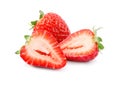 Delicious whole and cut strawberries on white background