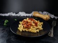 Delicious Whole Wheat Fusilli Pasta with Tomato Sauce. Garnish, gourmet. Royalty Free Stock Photo