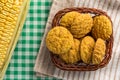 Delicious yellow cookie and corn cob. Sweet food of Festa Junina, a typical brazilian party. Royalty Free Stock Photo