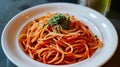 Deliciously Classic: Spaghetti Pomodoro, Served Picture-Perfect on a White Plate in
