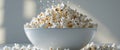 Deliciously Fresh Popcorn in a Bright White Bowl for Snacking Delight. Royalty Free Stock Photo