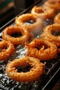 Deliciously fried calamari rings golden, crispy, and tender perfection achieved in oil