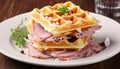 Deliciously savory ham and cheese filled waffles, exquisitely plated and ready to be enjoyed