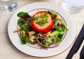 Deliciously tomato stuffed with tuna on a pillow of salad Royalty Free Stock Photo