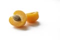 Sunny Sensations: Half Apricot with Pip in a Pure White Oasis. on a pure white background