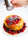 Deliciuos pancake with fresh fruit on white Royalty Free Stock Photo