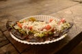 Mexican tlacoyos, a dish made with blue corn and filled with fried beans or broad beans, similar to mexican gordita, with guacamol Royalty Free Stock Photo