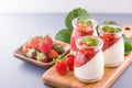 Delicous and nutritious double color colour strawberry desserts with mint and diced sarcocarp topping  with airy blue Royalty Free Stock Photo