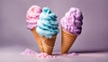Three cotton candy flavored ice cream cones isolated on a white background. Pink, blue and purple color. Royalty Free Stock Photo