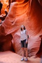 Delighted female tourist in Lower Antelope Canyon