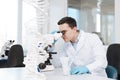 Delighted practitioner working in the laboratory Royalty Free Stock Photo