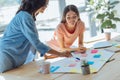 Delighted pretty women discussing a project Royalty Free Stock Photo