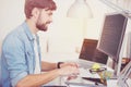 Delighted programmer doing his work enthusiastically