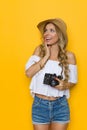 Delighted Woman With A Camera Royalty Free Stock Photo