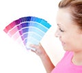 Delighted woman choosing colors