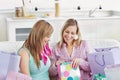 Delighted women with shopping bags