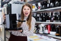 Delighted young woman with purchase