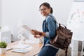 Delighted young woman studying bioengineering