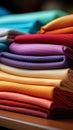 A delightful array of multicolored fabrics presented on matting texture background Royalty Free Stock Photo