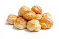 Delightful array of profiteroles showcasing smooth cream filling on a bright white surface