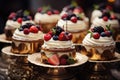 A delightful assortment of cupcakes adorned with a colorful array of fresh fruits, Sweet tasty cakes with berries and cream on a Royalty Free Stock Photo