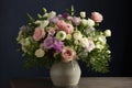 delightful bouquet of pastel flowers in a sleek vase