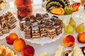 Delightful cut chocolate cake stands served on white plate