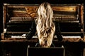 Delightful girl with luxurious long hair plays a retro piano. Back view