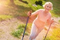 Optimistic elderly woman having a rest outdoors Royalty Free Stock Photo