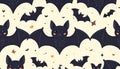 A delightful seamless repeating pattern featuring adorable cartoon bats in various sizes against a light cream colored background Royalty Free Stock Photo